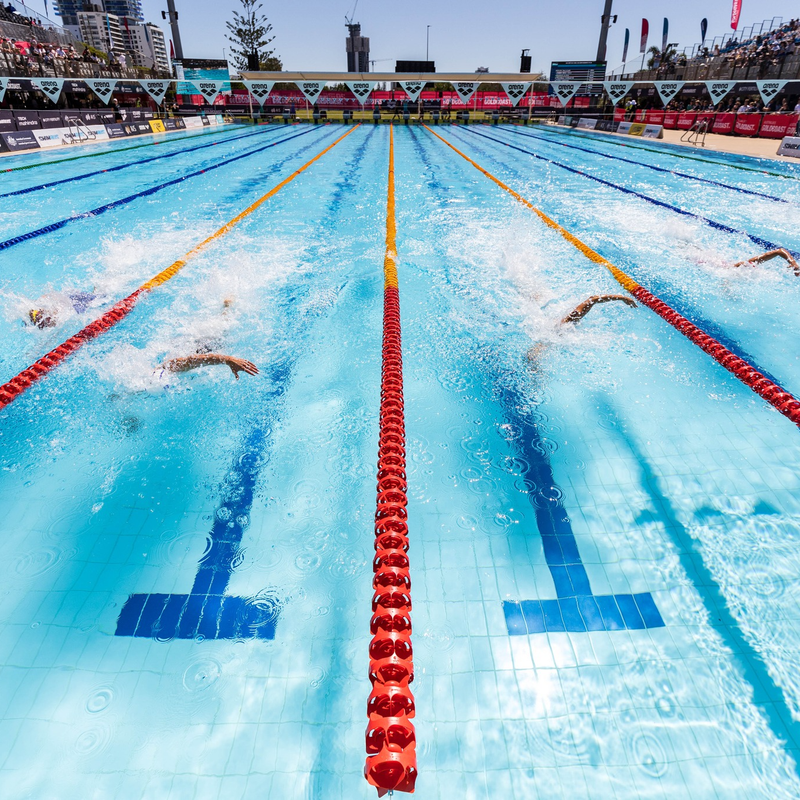 Aerial view of outdoor Olympic swimming pool with lane dividers